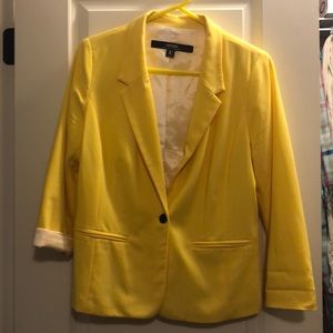 Yellow blazer.